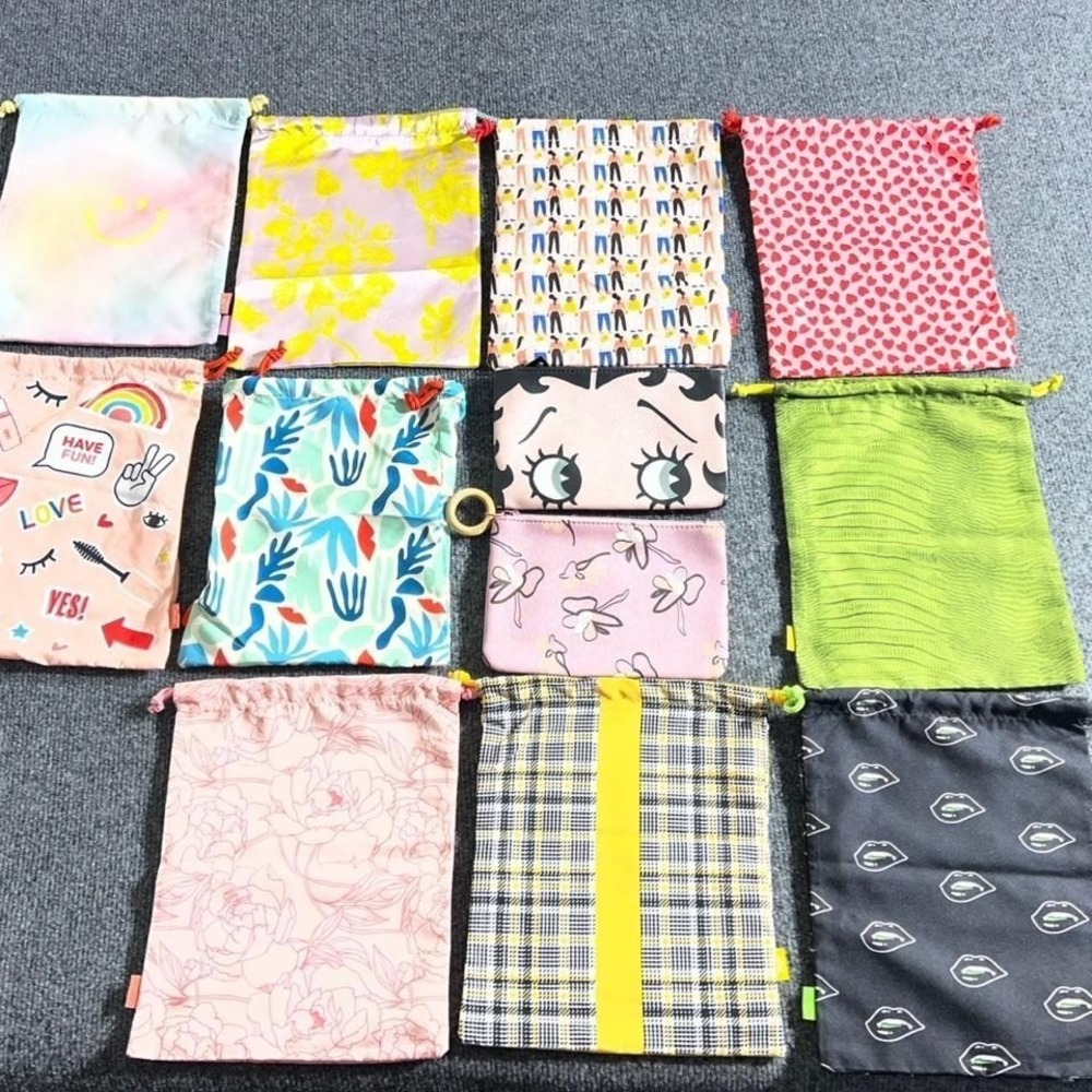 Ipsy Set of 12 multi coloured makeup bags & Zip Ups